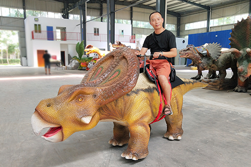 motorized ride on dinosaur
